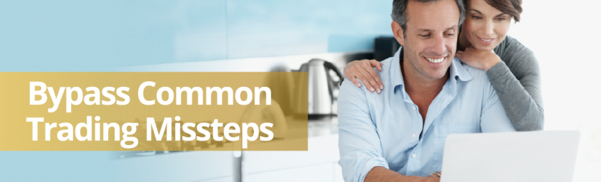 Photo of attractive middle-age couple looking at a laptop. The caption says "Bypass Common Trading Missteps."